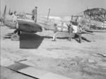 Damaged Hs 129B aircraft (foreground) and wreck of Me 323D Gigant aircarft (background) at El Aouiana Airfield, Tunis, Tunisia, May 1943