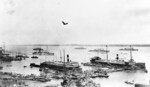 US Navy Asiatic Fleet destroyers USS Pruitt, USS Stewart, USS Preble, USS Hulbert, and USS William B. Preston at Hankou, Hubei Province, China, Apr-May 1923; note NKK Nisshin Kisen Kaisha steamships and many small river craft in foreground