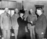 Secretary of War Henry Stimson presenting Brigadier General Theordore Roosvelt, Jr.’s posthumous Medal of Honor to his widow, Eleanor Butler Roosevelt, Washington DC, 21 Sep 1944.