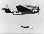 Grumman TBF-1 Avenger aircraft of US Navy Torpedo Squadron 4 dropping Mark XIII practice torpedo in training flight, location unknown, 30 Oct 1942