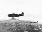 TBM Avenger torpedo planes of Composite Squadron 84 from USS Makin Island flying over Ie Shima, Ryukyu Islands, Japan, 16 Apr 1945