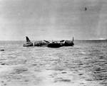 B5N2 torpedo bomber wreckage sitting atop Indispensable Reef as it was found on 9 Jun 1942; she was lost during the Battle of Coral Sea