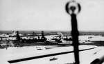 View of Rotterdam, the Netherlands during an aerial attack, 16 Jul 1941, seen from the dorsal turret of a Blenheim bomber