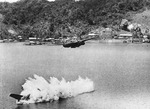 Douglas A-20G Havoc of the 387th Bomb Squadron crashing into the water after being shot down by anti-aircraft fire during an attack on Kokas, western New Guinea, 22 Jul 1944. All crewmembers were killed. Photo 3 of 4.