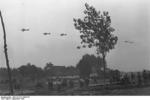 German Ju 87 Stuka dive bombers flying over German troops, Poland, Sep 1939