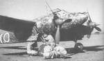 Ground crew performing maintenance or repairs on a Ki-45 aircraft, date unknown