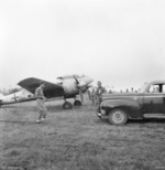 Australian Lieutenant Colonel R. A. C. Muir and Dutch Colonel de Rooy inspecting a captured Japanese Ki-46 aircraft at Menado, Celebes, Dutch East Indies, 3 Oct 1945