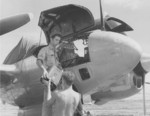 US Army photo technicians servicing a F-5B Lightning reconnaissance aircraft 