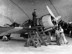 Re.2000 Falco I fighter in maintenance on Pantelleria island, Italy, 1940s