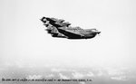 Six P-40 Warhawk fighters based at Hickam Field in flight over Oahu, US Territory of Hawaii, 1 Aug 1941, photo 1 of 2