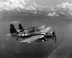 FM-2 Wildcat of USS White Plains, fly an escort mission, probably during air strikes on Japanese facilities on Rota Island, Marianas, 24 Jun 1944