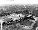 Crew of USS Makin Island attempted to pull an upended FM-2 Wildcat from the flight deck