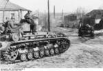 German Das Reich Division Panzer IV tank entering the outskirts of Kharkov, Ukraine, Mar 1943