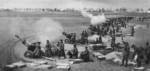 Soviet ZiS-3 guns bombarding German positions near Seelow Heights east of Berlin, Germany, 16-19 Apr 1945, photo 1 of 2