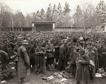 Hungarian prisoners of war being guarded by a US soldier, Garmisch-Partenkirchen, Germany, circa May-Jun 1945