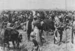 Japanese troops guarding Chinese refugees displaced by war and the Yellow River Flood, China, Jun-Jul 1938