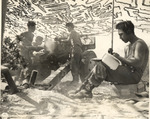 Japanese-American soldiers of 552nd Field Artillery Battalion of US 442nd Regimental Combat Team firing a 105-mm howitzer, Castellina Sector, Livorno, Italy, 12 Jul 1944