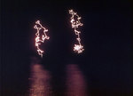 Starshells or other pyrotechnics over Iwo Jima, night of 19 Feb 1945, photo 1 of 2