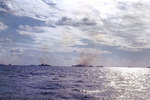 Cruisers Pensacola, Salt Lake City, Indianapolis, and an unidentified Cleveland-class cruiser bombarding Iwo Jima, 19 Feb 1945