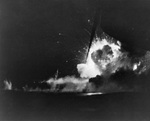 Carrier Bismarck Sea erupted in flames as she was hit by a special attack aircraft off Iwo Jima, night of 21 Feb 1945