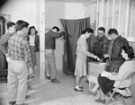 Resident of Block 14 of Jerome War Relocation Center voting for a block manager, Arkansas, United States, 17 Nov 1942