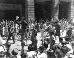 Victory celebration in Hong Kong, 30 Aug 1945; photo taken by HMCS Ontario Leading Photographer Sydney H. Draper