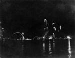 Fireworks display during the victory celebration in Hong Kong, 30 Aug 1945; taken by HMCS Ontario Leading Photographer Sydney H. Draper