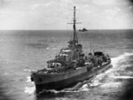 HMAS Nestor underway alongside of HMS Formidable (not pictured), Indian Ocean, late Apr or early May 1942