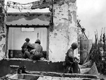 US Marines conducting street fighting in Garapan, Saipan, Mariana Islands, Jul 1944