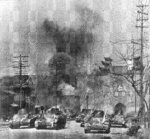 Japanese Type 94 tankettes at the moment that the Zhonghua Gate of the Nanjing city wall was breached, Nanjing, China, 12 Dec 1937 at 1210 hours