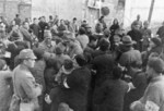 Japanese officers with Chinese civilians, Nanjing, China, 17 Dec 1937, photo 2 of 3