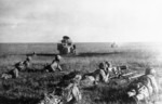 Japanese Type 92 machine gunner and infantry in Mongolia Area, China, Jul 1939; note Soviet BA-6 armored car in background