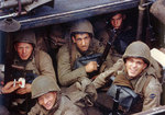 US Army Rangers awaited the invasion signal in a landing craft in an English port, circa early Jun 1944, photo 2 of 2; note the bazooka and the M1 Garand rifles