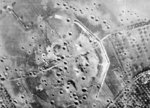 Aerial photo of the gun battery at Merville, Normandy, France after bombardment, circa May 1944; note the bombing failed to neutralize the battery before Normandy landings