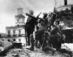 Members of a Polish Army anti-aircraft crew posing with their Ckm wz.30 machine gun, Warsaw, Sep 1939