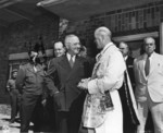 Harry Truman speaking with US Army chaplain Colonel Curtis Tuernan during the Potsdam Conference, Germany, 22 Jul 1945