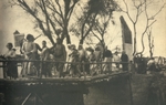 Japanese soldiers walking among Chinese refugees near the village of Shengjiaqiao in Baoshan, Jiangsu, China, 14 Oct 1937; seen in 10 Nov 1937 issue of Japanese publication Asahigraph