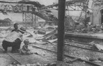 Injured Chinese toddler crying in the South Station in Shanghai, China, 28 Aug 1937, photo 2 of 2