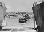 Universal Carrier being pulled by a bulldozer during the Allied landing on Sicily, Italy, 10 Jul 1943