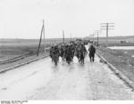 Spanish Nationalist troops on the march during the Battle of Guadalajara, Spain, Mar 1937