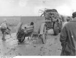 Spanish Nationalist field gun being towed by a truck, the Battle of Guadalajara, Spain, Mar 1937