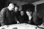 Soviet leaders reviewing a map of Stalingrad, Russia, 1 Dec 1942; left to right: Nikita Khrushchev, Alexei Ilarionovich, Alexei Chuyanov, Andrey Yeryomenko