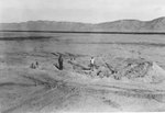 Two men at the Operation Trinity crater, circa Aug 1945