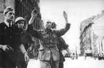 Polish resistance fighters and a German POW, Warsaw, Poland, 20 Aug 1944