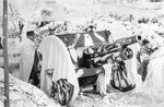 Finnish 76-mm field gun camouflaged in snowy terrain, Viipuri, Finland, 9 Mar 1940