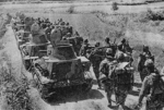 Japanese Type 94 Te-Ke tankettes and infantry advancing toward Wuhan near Naxi, Yangxin County, Hubei Province, China, 4 Oct 1938