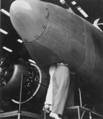 Two female workers in the nose section of a PV-1 aircraft, Lockheed factory, Burbank, California, United States, Aug 1943