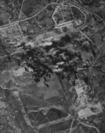 Shinchiku Airfield under B-29 attack, northern Taiwan, 17 Jan 1945, photo 3 of 3