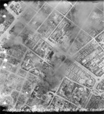 Taihoku General Government Building (near bottom of photograph) under aerial attack, Taihoku (now Taipei), Taiwan, 31 May 1945