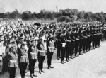 Hitler Youth members holding a symbolic greeting ceremony for Emperor Showa at the Nijubashi Bridge at the entrance to the Imperial Palace, Tokyo, Japan, Oct 1938